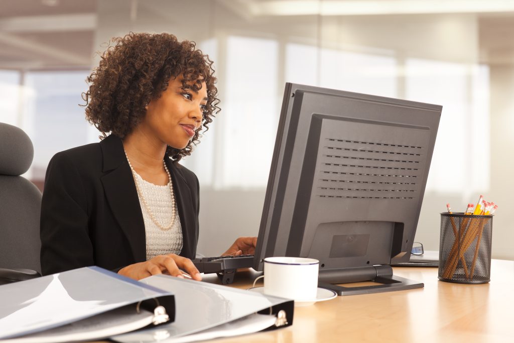 woman on office computer