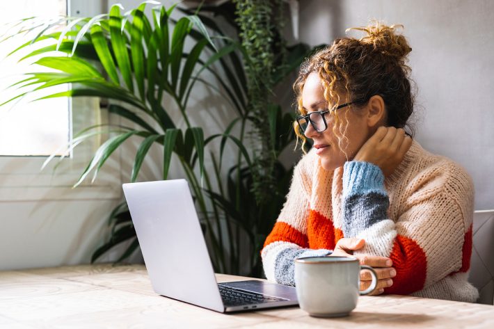 woman on laptop mailing from anywhere