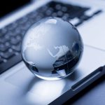 Clear globe on top of keyboard, to represent international mail